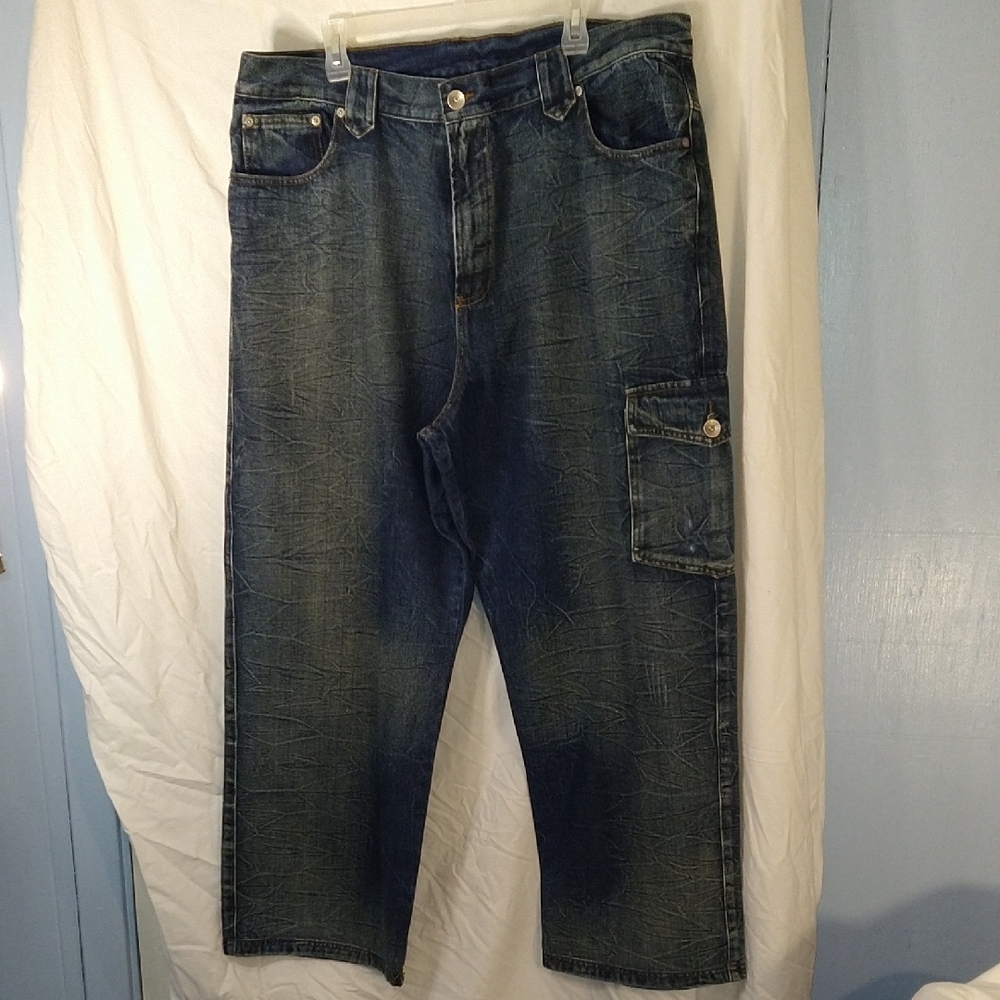 Blue Relaxed Fit Jeans with Vintage Wash. Button Missing On Back Right Pocket.